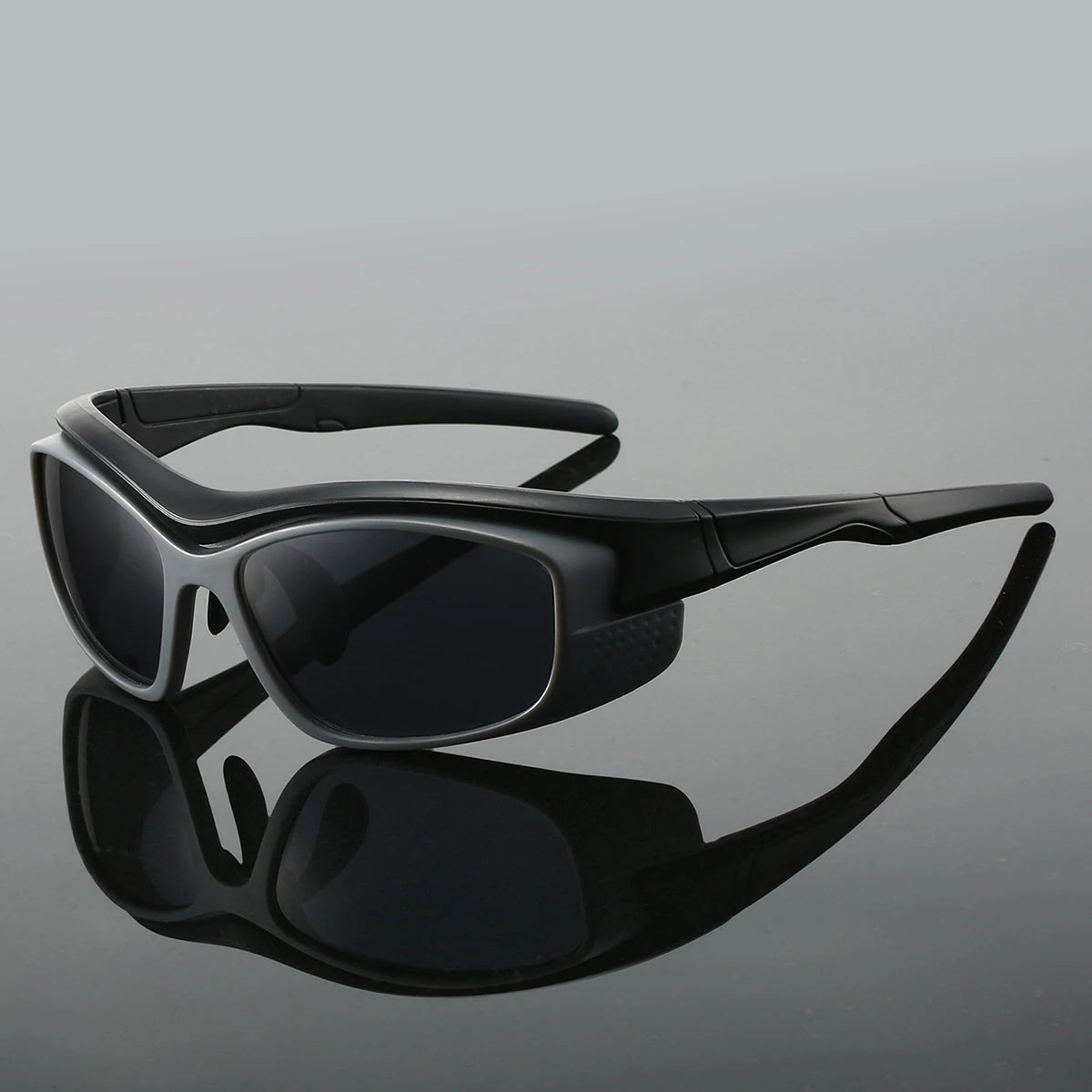 Black wraparound matte sunglasses with UV-blocking lenses, lightweight futuristic athletic frame design