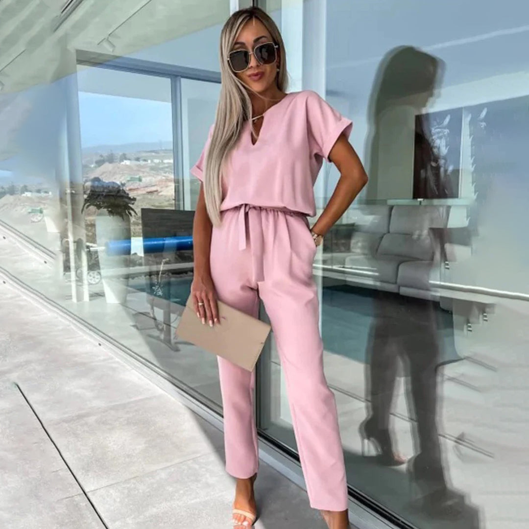 Women's chic cotton-blend jumpsuit elegant silhouette elastic waist flattering breathable one-piece