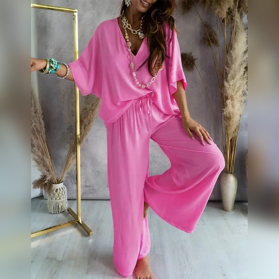 Women's oversized v-neck leisure set with matching pants, soft breathable fabric for everyday comfort