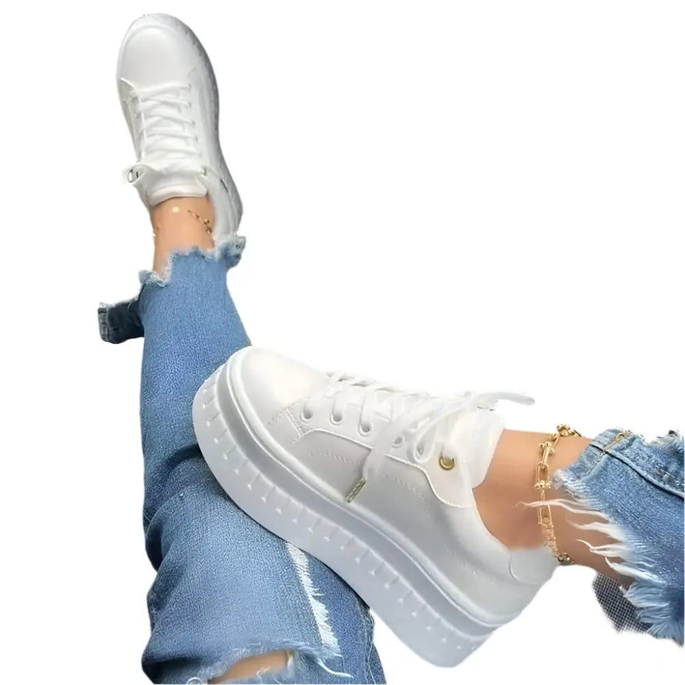 Women's white platform sneakers with chunky sole, lightweight silhouette for all-day comfort and height boost