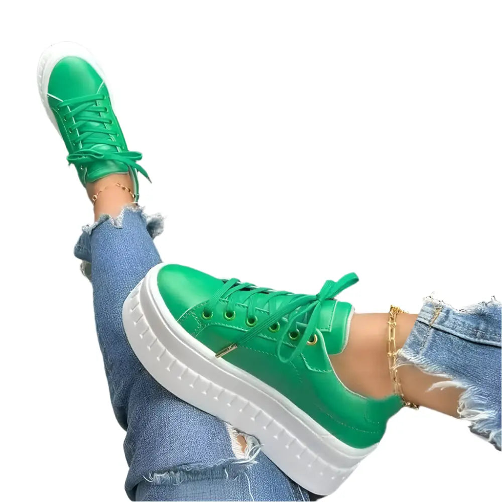 Women's white platform sneakers with chunky sole, lightweight silhouette, and all-day comfort design