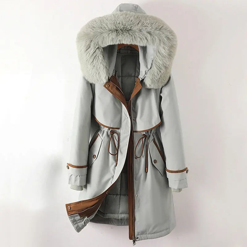 Women's long winter parka coat with plush faux fur hood, breathable warmth, elegant cold-weather style