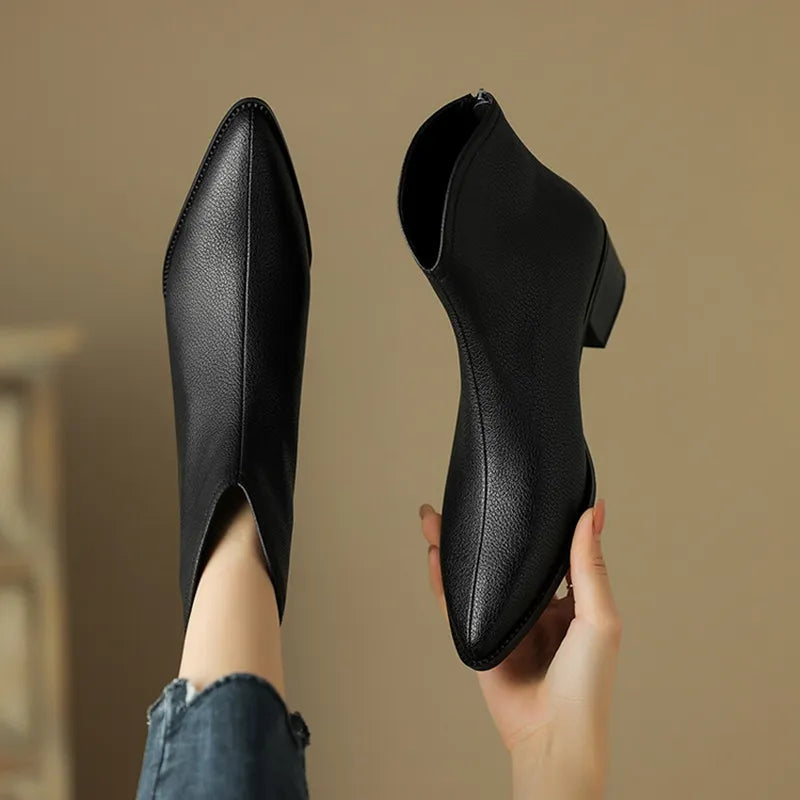Women's pointed toe ankle boots in classic black PU leather with chic block heel for all-day comfort