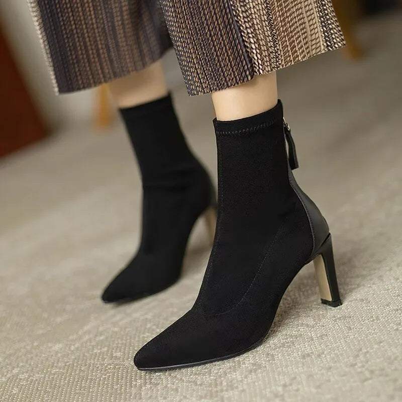Black pointed toe stiletto ankle boots in faux leather, elegant everyday chic footwear for women