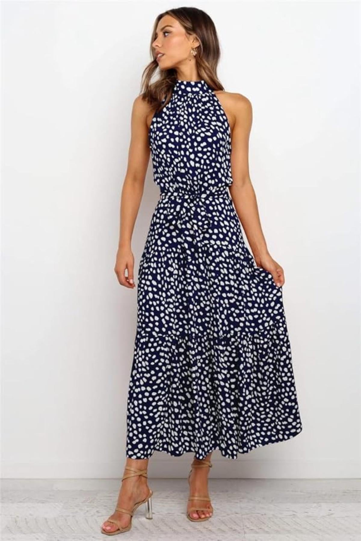 Black white polka dot halter midi dress fit-and-flare silhouette with adjustable waist tie