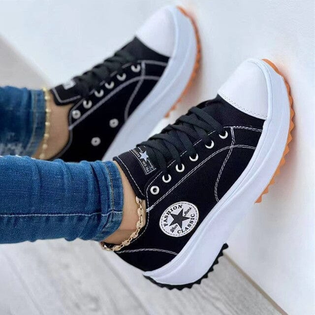 Women's white low-top canvas chunky sole sneakers with bold platform rubber outsole for everyday style