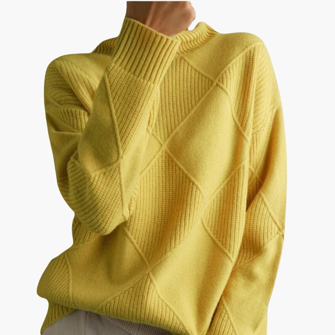 Women's cream turtleneck pullover sweater with geometric ribbed knit pattern and cozy high collar