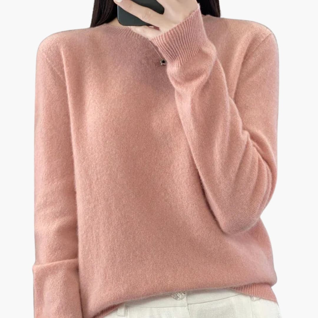 Women's minimalist round neck pullover sweater with ribbed cuffs, hem, and timeless knit design