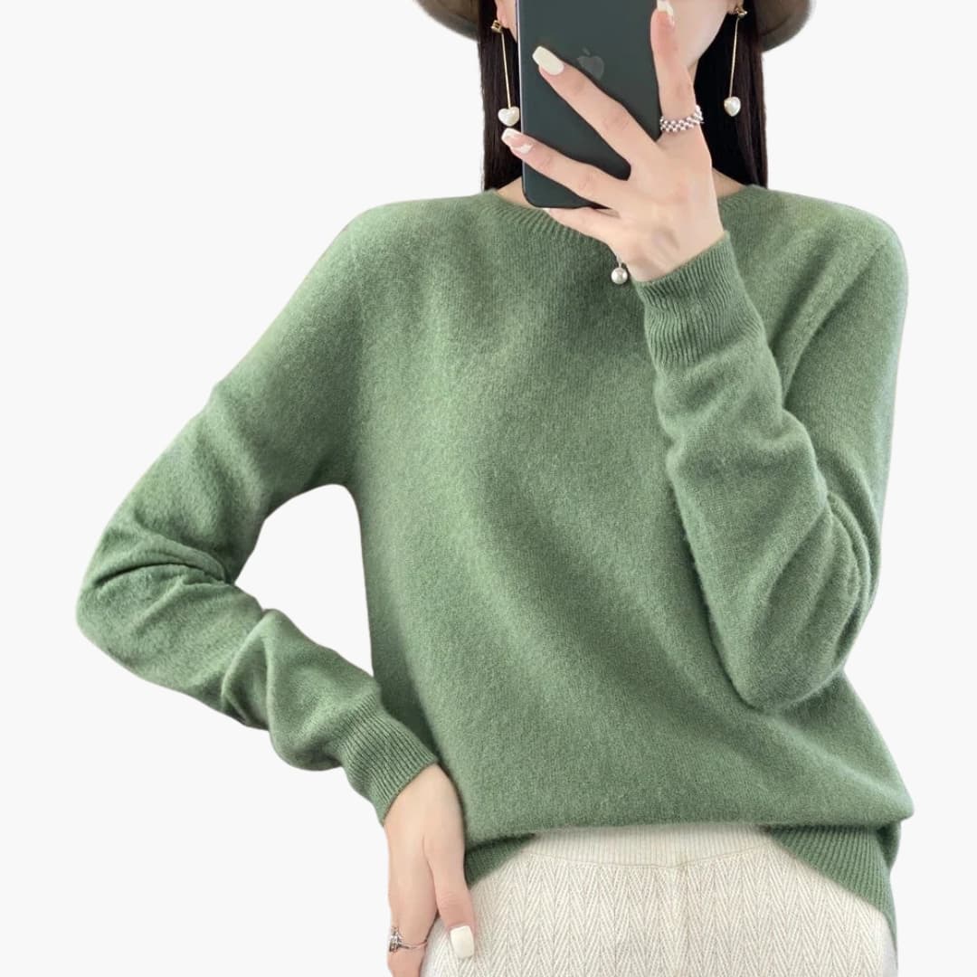 Women's round neck pullover sweater in minimalist knit with ribbed cuffs, hem, and timeless everyday style