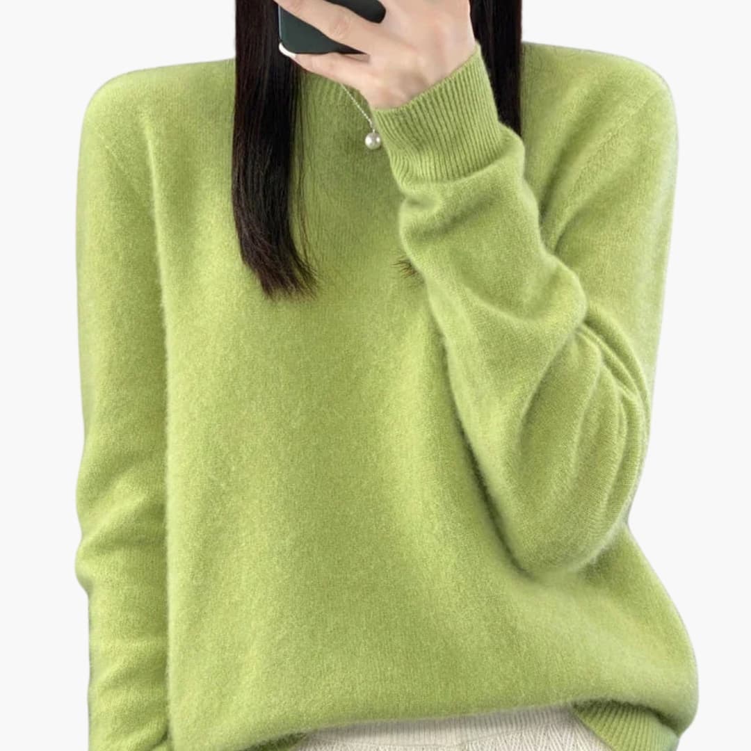 Women's beige minimalist round neck pullover sweater with ribbed cuffs, hem, and timeless knit design