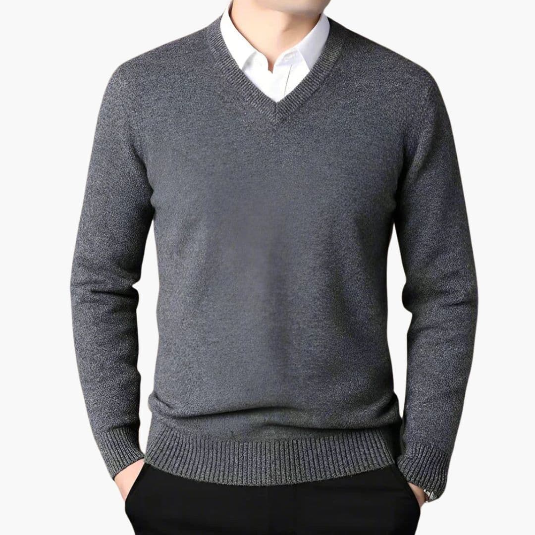 Men's classic navy V-neck knit sweater with ribbed collar, cuffs, and hem for versatile everyday wear