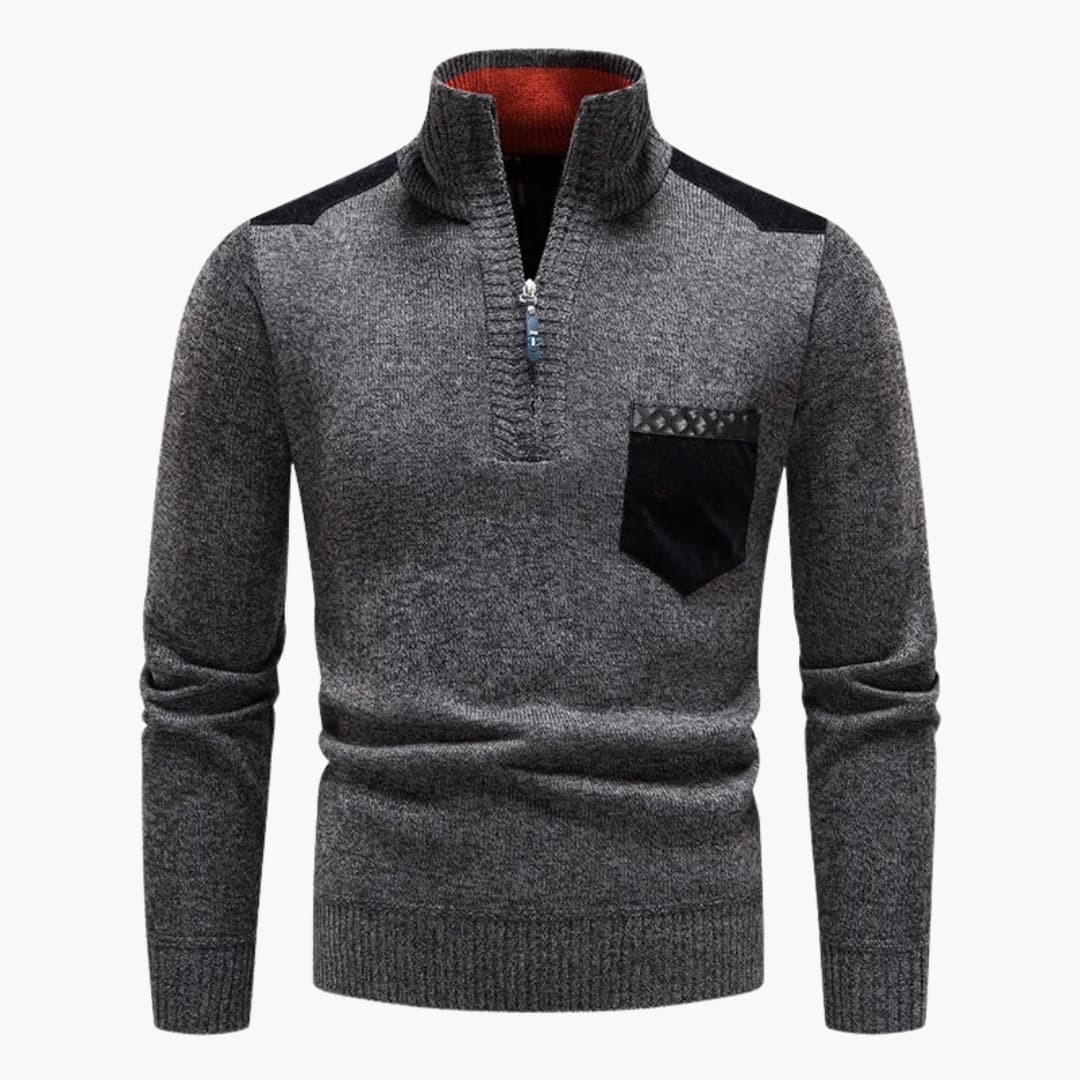 Men's gray half-zip knit sweater with ribbed stand-up collar, chest pocket, and ribbed hem
