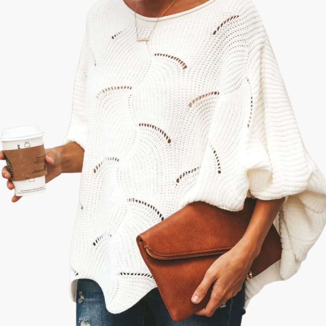 Women's loose knit sweater with batwing sleeves, scalloped hem, cozy everyday style