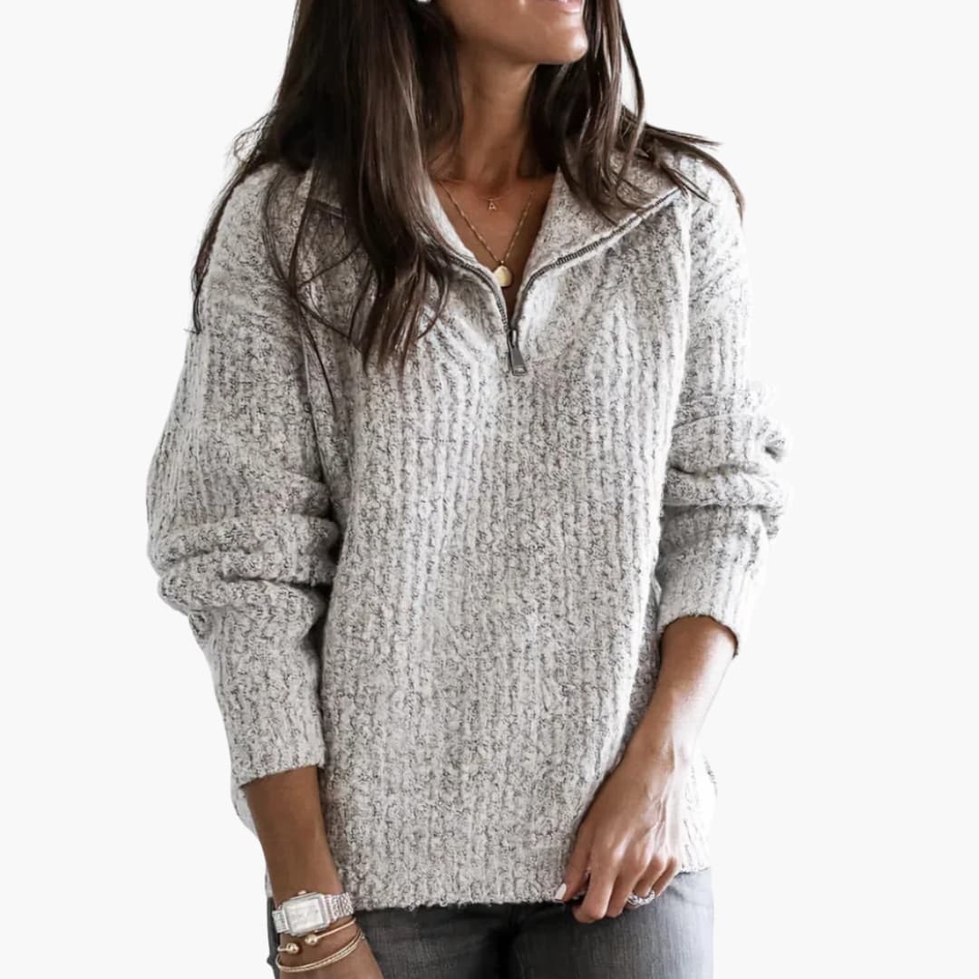 Women's soft ribbed knit sweater with zip collar, relaxed structured fit, neutral tone