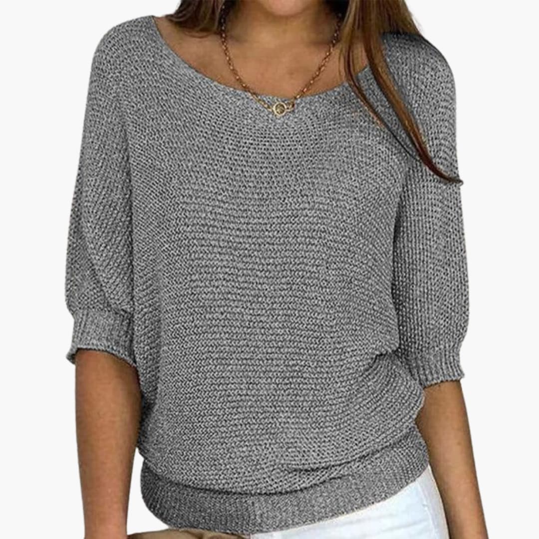 Women's loose fit cozy knit sweater round neck ribbed hem mid-length sleeves casual everyday wear