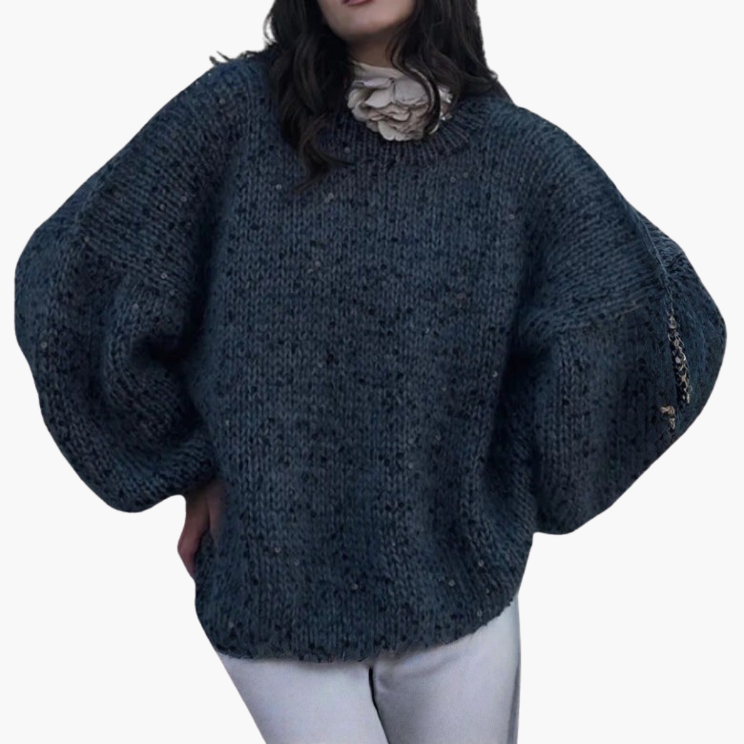 Women's cozy wide-sleeve knit sweater with thick reflective patterned surface and relaxed silhouette