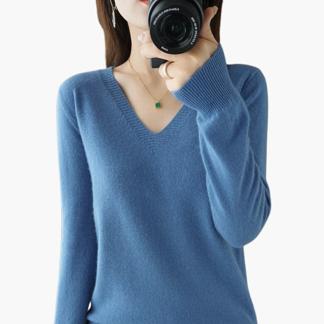 Women's relaxed V-neck sweater minimalist style versatile layering piece for work and everyday wear