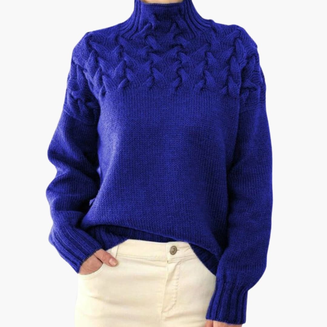 Women's ivory cable knit sweater with high neck, twisted pattern upper, and structured stand-up collar