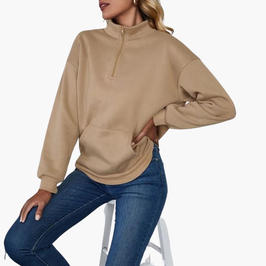 Women's zip-up stand collar sweater in solid color with front pockets, cozy casual fit