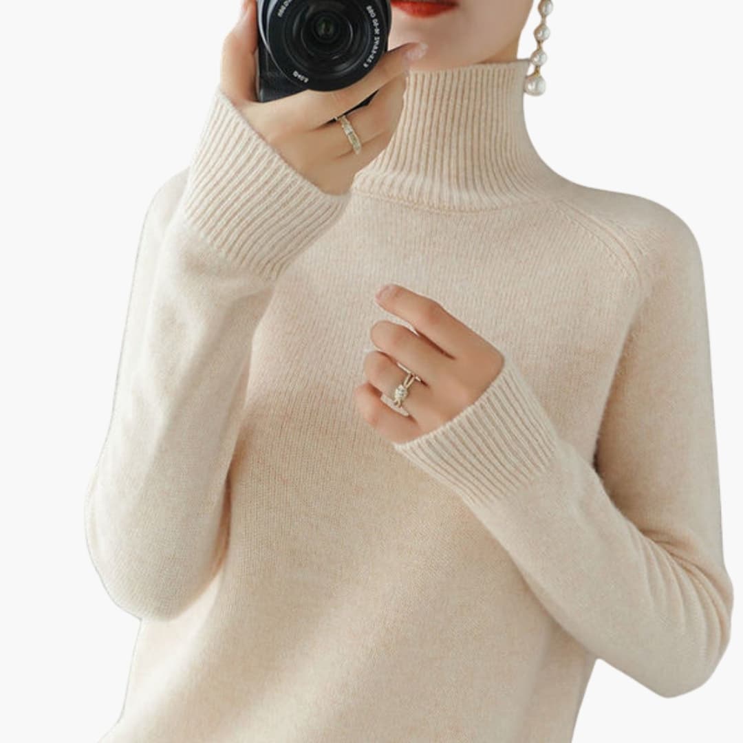 Women's ribbed turtleneck sweater with long sleeves and structured hem, versatile everyday layering essential