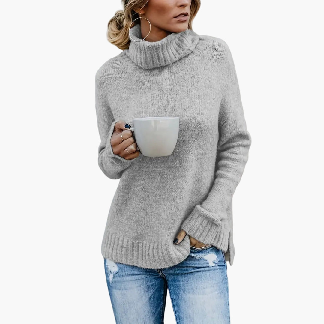 Women's cozy knit turtleneck pullover with side slits, long sleeves, ribbed cuffs, relaxed silhouette