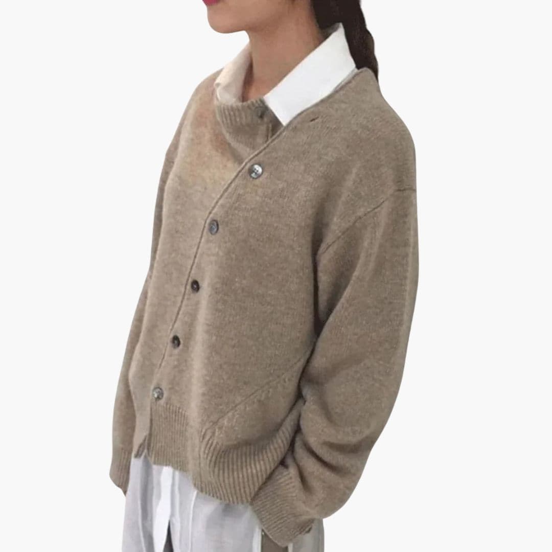 Women's cozy knit pullover sweater with asymmetric button closure and layered collar in neutral tone