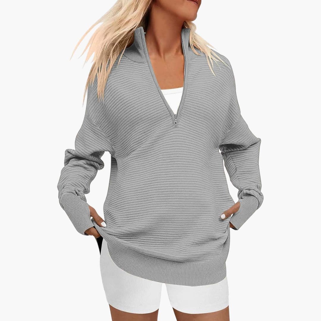 Women's ribbed knit zip-up sweater with high collar, minimalist style, full-length zipper, everyday warmth
