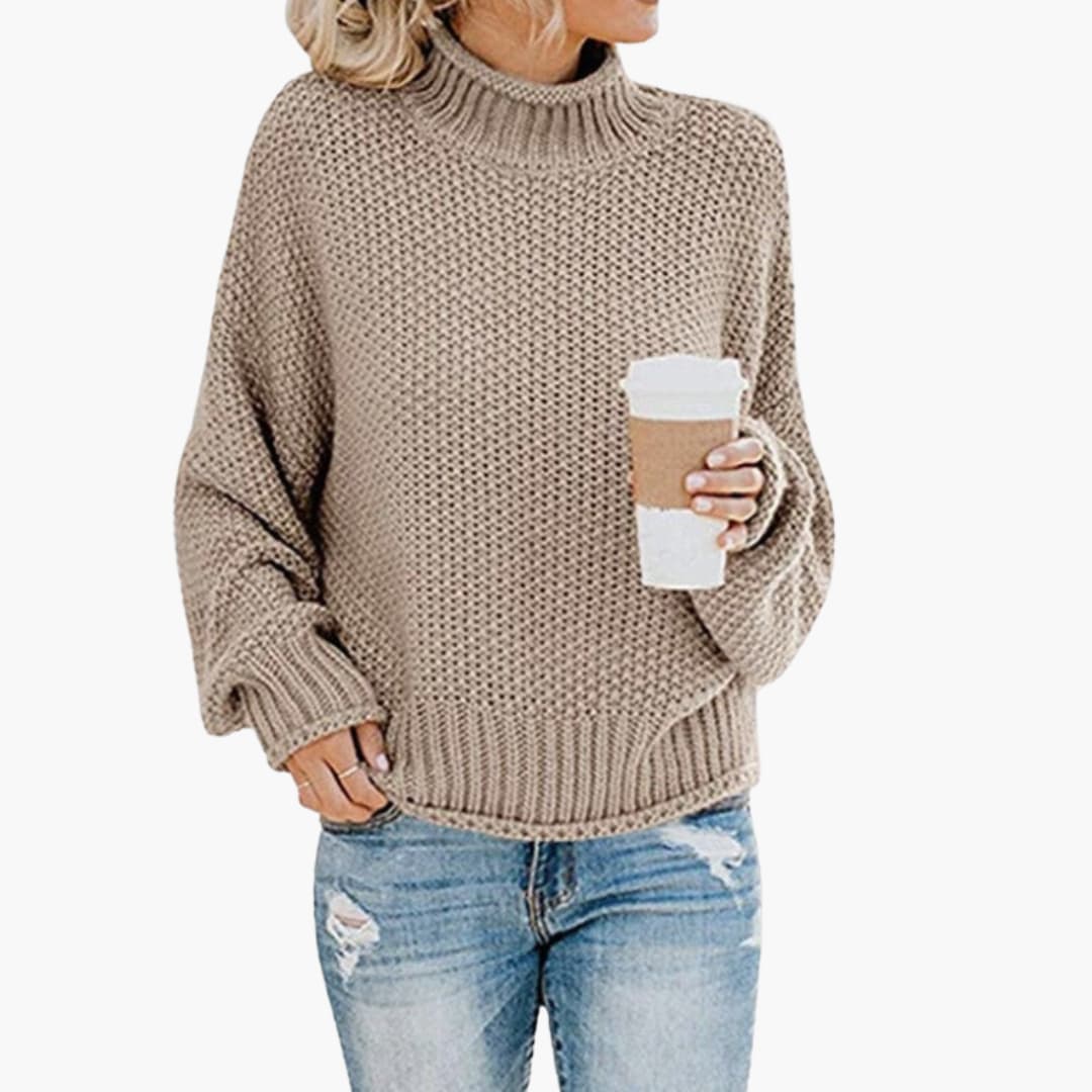 Women's cozy camel turtleneck pullover with ribbed stand-up collar and textured knit surface