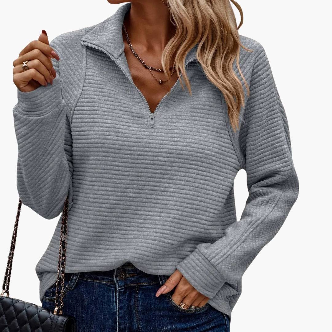 Women's beige ribbed knit V-neck half-zip pullover sweater with adjustable neckline for layering