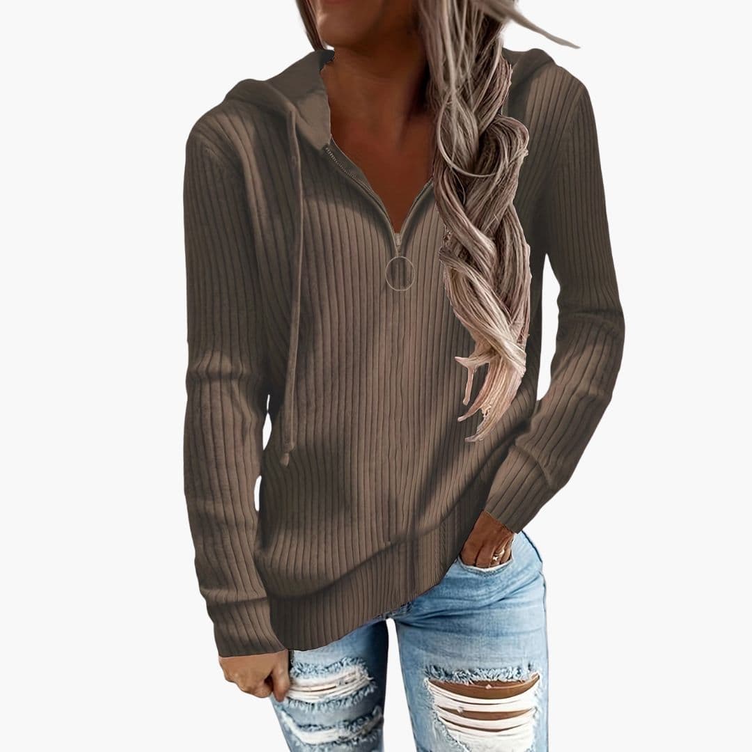 Women's ribbed knit hoodie sweater with high collar, front zip closure, in cozy layered style