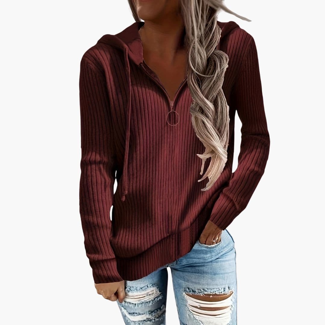 Women's ribbed knit hoodie sweater with high collar, front zip closure, in cozy layered style