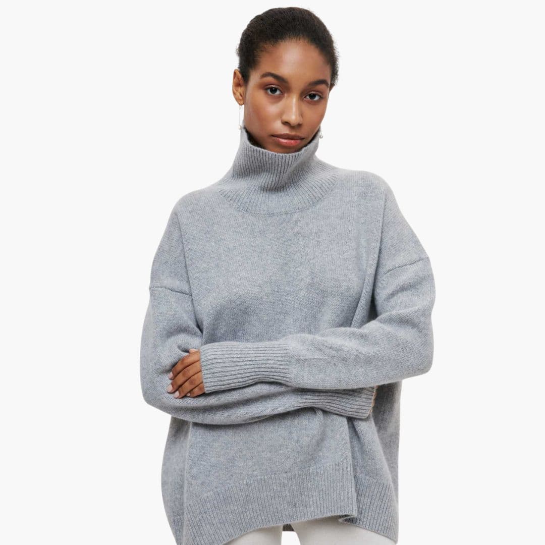 Women's loose fit ribbed turtleneck knit sweater, cozy everyday style with ribbed hem detailing