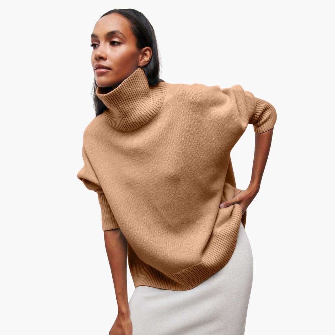 Women's loose-fit ribbed turtleneck knit sweater in solid neutral tone for cozy everyday layering