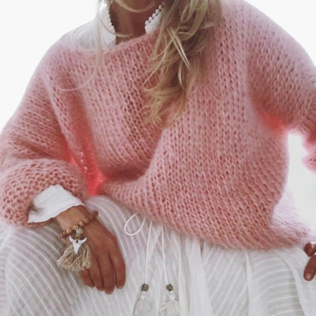 Women's cozy knit sweater with embroidered floral pattern, ribbed hem and cuffs, round neckline