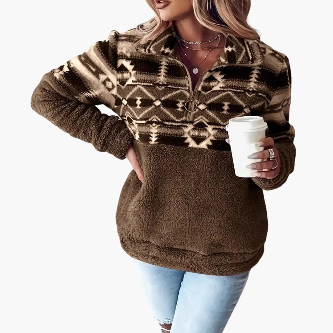 Women's Aztec-pattern fleece pullover with half-zip collar, cozy geometric design for casual warmth