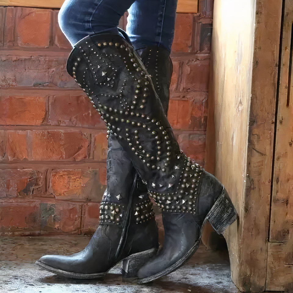 Women's studded cowboy boots chunky block heel Western festival style bold metal stud detailing