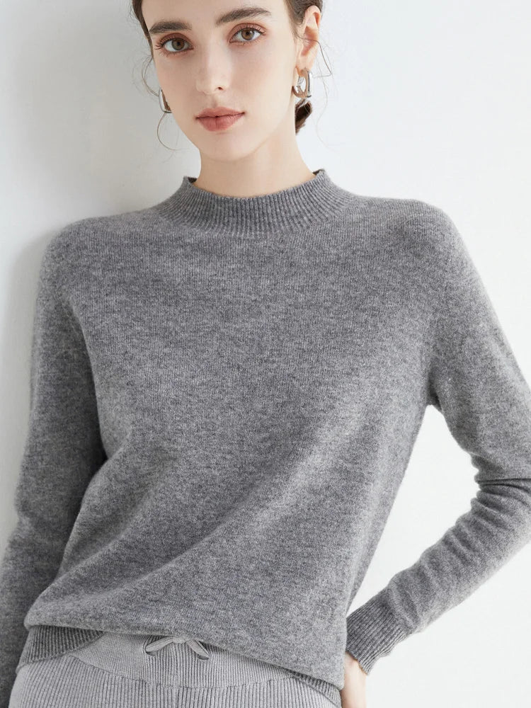 Elegant women's knit sweater in classic tones, timeless silhouette perfect for office and cozy evenings