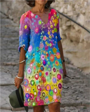 Women's floral midi dress with V-neck, artistic face print, floral accents, sophisticated everyday style