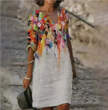 Women's floral midi dress with V-neck, artistic face print, and delicate floral accents for everyday sophistication