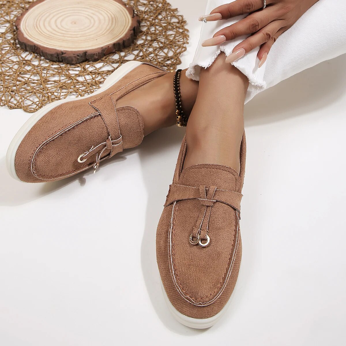 Women's beige suede moccasin slip-on flat with soft PU finish and cushioned everyday support