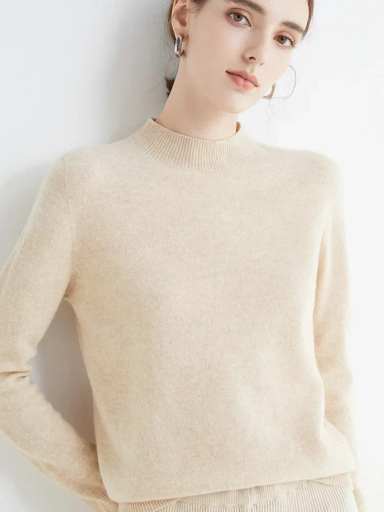Elegant women's knit sweater in neutral tones, timeless silhouette for office and cozy evenings