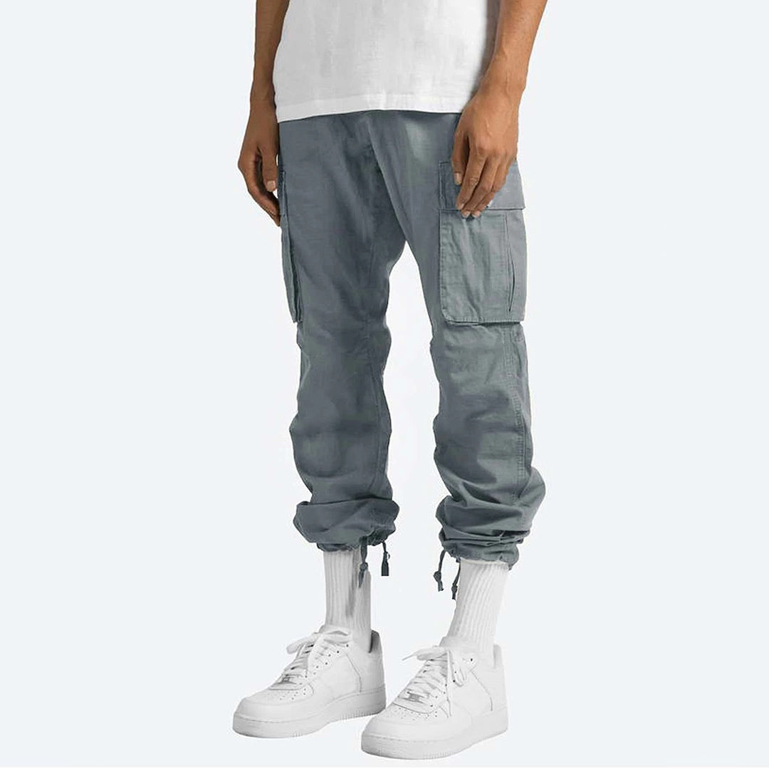 Men's relaxed fit cargo pants in neutral tone, straight leg cut with multiple utility pockets