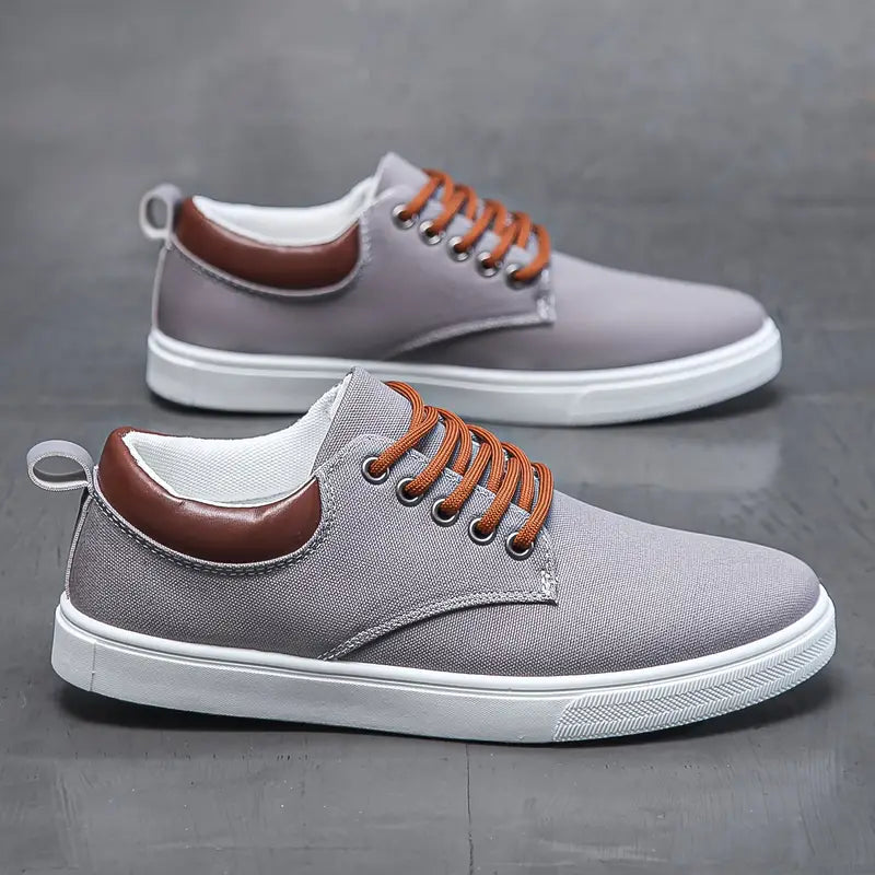 White canvas casual sneakers with contrast laces, soft padded collar, lightweight urban everyday style