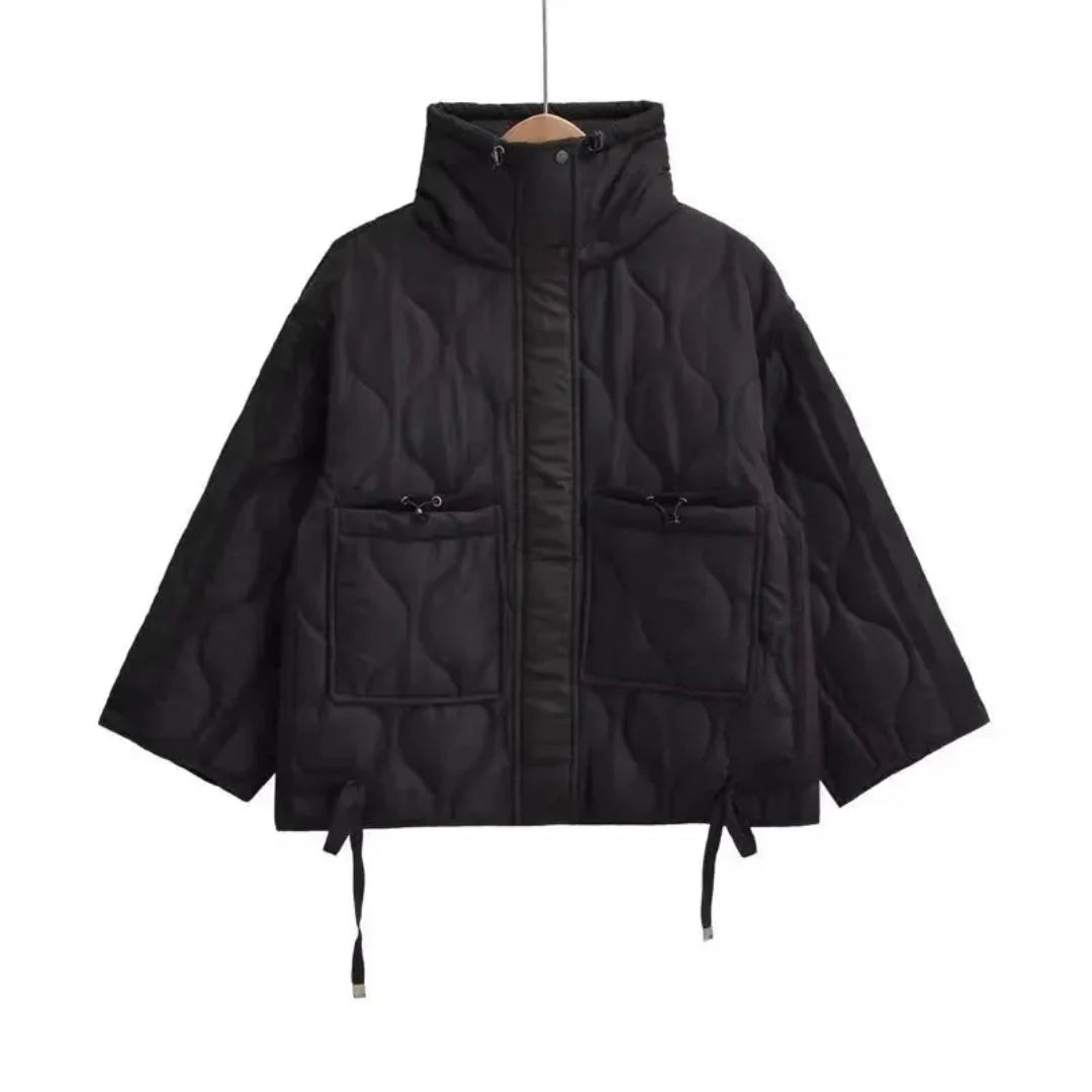 Black quilted puffer jacket stand collar wave-pattern stitching modern city everyday warmth