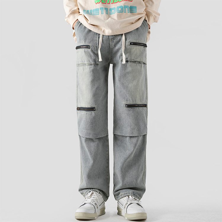 Washed cargo denim pants streetwear style with four zip pockets rugged vintage comfort fit