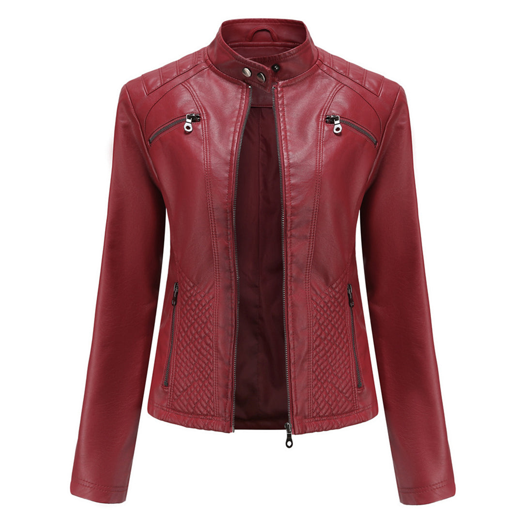 Women's black faux leather biker jacket with classic zip-up closure and flattering edgy silhouette