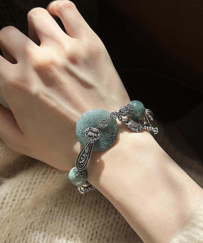 Bracelet à breloques papillon en argent sterling vert noirâtre rétro avec jade - Urbann-Vibe