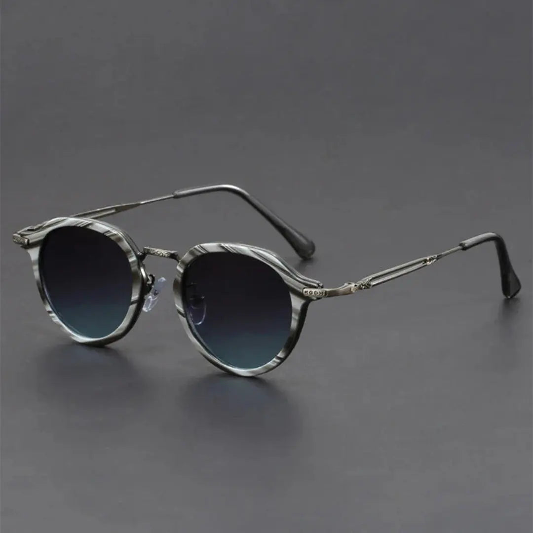 Retro round sunglasses textured metal frame UV400 lenses vintage-inspired lightweight unisex eyewear