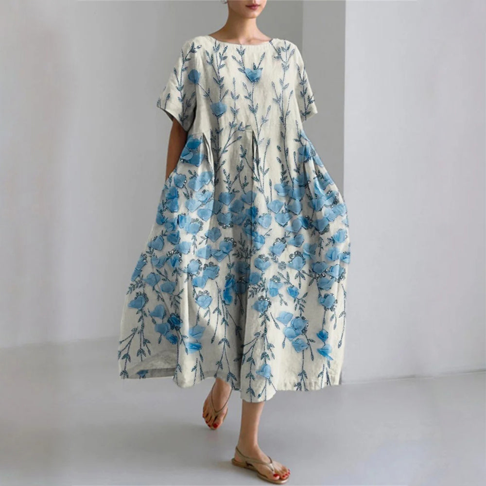 Floral midi dress by Sofia Amoretti in vibrant all-over print, fluid SilkenWeave drape, bold statement silhouette