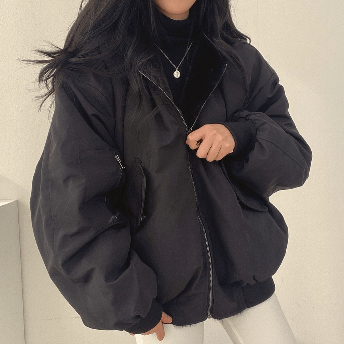 Women's insulated zip-up winter jacket in cozy fit with full-length zipper for cold weather style